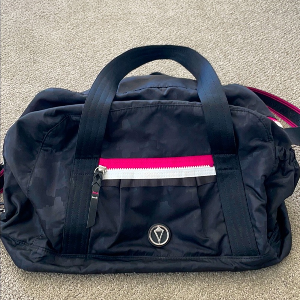 Ivivva black and pink duffle bag
